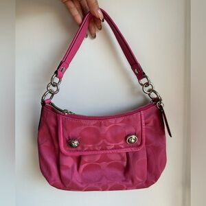 Coach Poppy purse in fuchsia with C print.